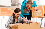 Women packing up belongings